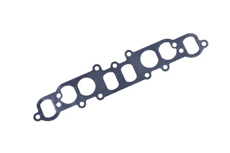 car manifold gasket paronite inline auto parts on white background close-up