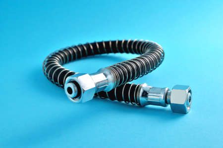 brake hose for a truck, car accessories, auto parts, car brake system parts on a blue background...