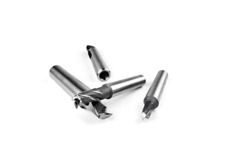 cutters for metal processing, fixtures and tools for metal processing on a white background close up