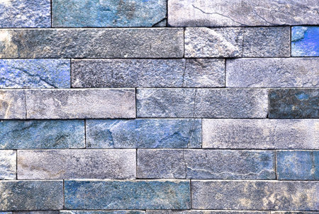Color stone wall, background, texture, rectangular natural stones of different shades
