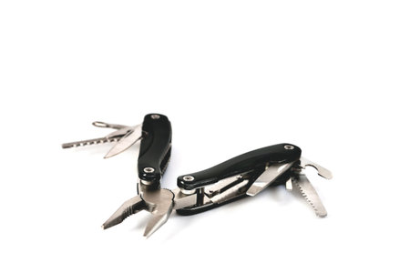 multi tool black on a white background close-up