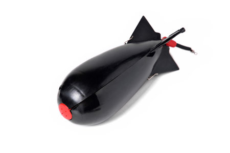 black fishing feeder rocket for feeder fishing white background close-up