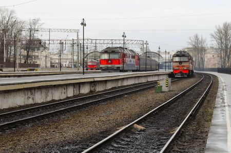 The trains are on the railroad tracks near the Vitebsk station.The City Of St. Petersburg.の写真素材