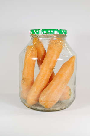 Carrots, placed in a glass jar and closed the lid, better kept.の写真素材
