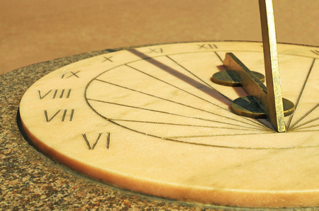 Old historic design.a sundial tells the time by shadows from the sun.の写真素材
