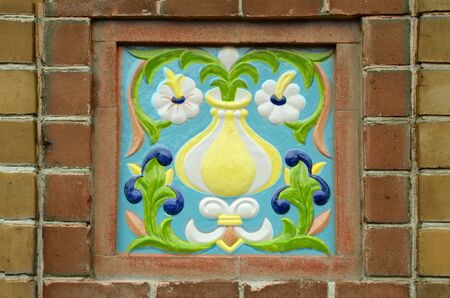 Ceramic flower pattern on the wall of the Church.Beautiful rarity.