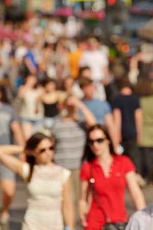A warm Sunny day.People in summer clothes are on the streets of the city.の写真素材