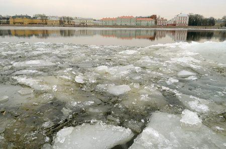 Spring has come.Began to melt the ice on the river.の写真素材