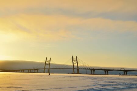 At the end of the day the sun sets over the horizon,creating a colorful look.の写真素材