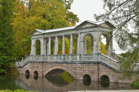 24.09.2016.Russia.Pushkin.Marble bridge is reflected on the surface of the lake.の写真素材
