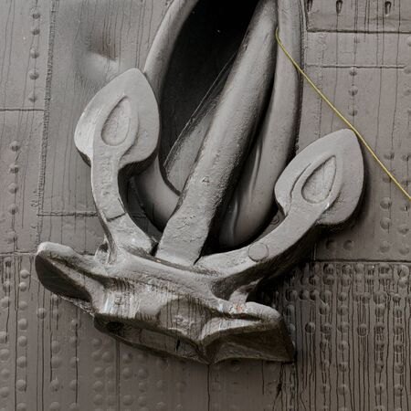 A heavy anchor holds a ship in one place.の写真素材