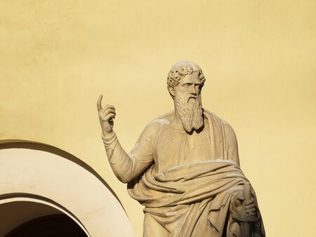The sculpture of St. Peter the Apostle at the entrance to the Church.