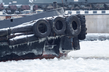 Rubber wheels on the bow of the ship protect it from damage.