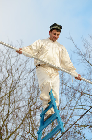 25.02.2017.Russia.Saint - Petersburg.Uzbek tightrope walkers perform at the festival of farewell to winter.のeditorial素材