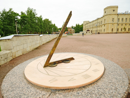 An ancient sundial.The shadow of the sun tells the time.の写真素材
