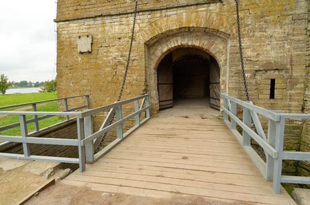 Stone gate to the fortress.Before them the bridge that rises.のeditorial素材