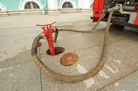 Fire hydrant - a device for taking water from a water supply system for fire fighting.の写真素材