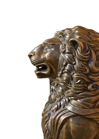 Sculpture of a lion on a white background.lion,as the personification of a predatory animal.の写真素材