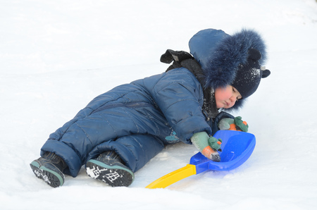 Little Timosha is playing on the Playground.Very cheerful and playful child.の写真素材