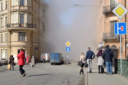 Saint-Petersburg.Russia.March.28.2018.There was a breakthrough of a heating main with hot water.The...