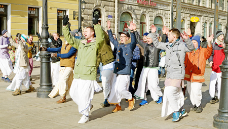 Saint-Petersburg.Russia.March.12.2017.Devotees of the Lord Krishna dance and sing.It's a form of meditation.People achieve happiness and peace of mind .のeditorial素材