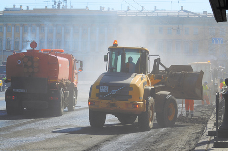 Saint-Petersburg.Russia.April.14.2018.Nevsky prospect.Work is underway on the laying of the road asphalt .Works are carried out in the accelerated mode.のeditorial素材