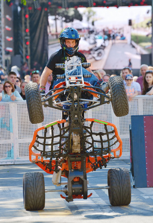 Saint-Petersburg.Russia.may.26.2018. Manege square.motorcycle festival .The rider on the ATV shows risky stunts.The driver has a high level of training.のeditorial素材