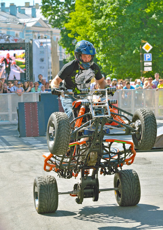 Saint-Petersburg.Russia.may.26.2018. Manege square.motorcycle festival .The rider on the ATV shows risky stunts.The driver has a high level of training.のeditorial素材