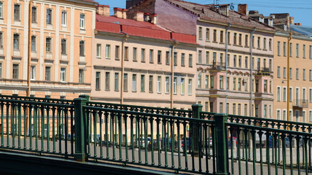 A fragment of the urban landscape.In the foreground is a bridge over the river.の写真素材