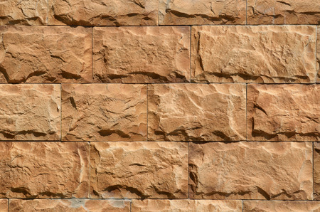 Wall of red brick.Masonry has a peculiar texture.の写真素材