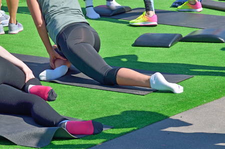 Performing sports massage for athletes.Muscles relax.Fatigue leaves the body.の写真素材