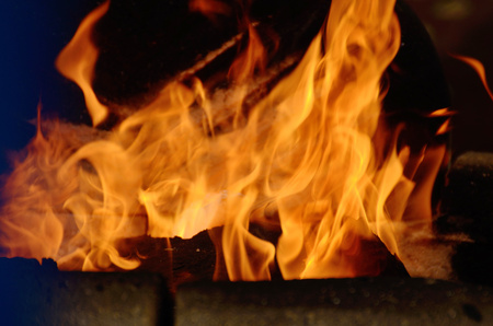 Bright flame of fire.It is a source of heat and light.の写真素材