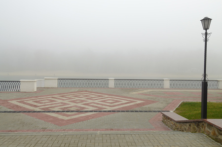 The river embankment is paved with tiles.A good place to relax in your free time.の写真素材