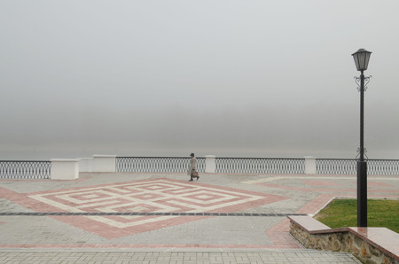 The river embankment is paved with tiles.A good place to relax in your free time.の写真素材