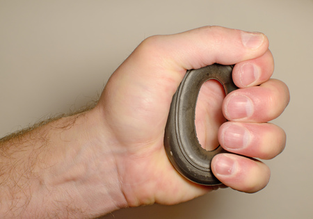 Power expander in hand.Develops strength and endurance of hands.の写真素材