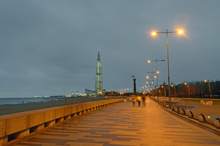Embankment paved with stone.At night it is illuminated by electric light.の写真素材