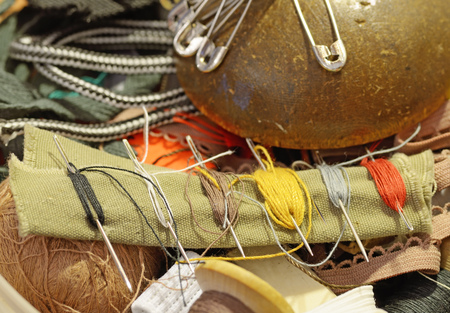 Different threads with needles.They are used by tailors in their work.の写真素材