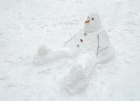 Snowman cobbled together by children.This traditional winter pastime.の写真素材