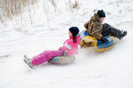 Saint-Petersburg.Russia.December.23.2018.Ride in winter from the mountains in tubing.They're inflatable cameras.They quickly glide on snow.のeditorial素材