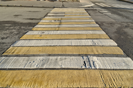 Marking pedestrian crossing.In the form of parallel white stripe .の写真素材
