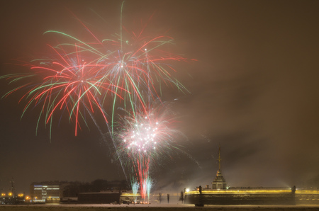 Beautiful festive fireworks for Christmas.Bright fireworks over the Peter and Paul fortress.の写真素材