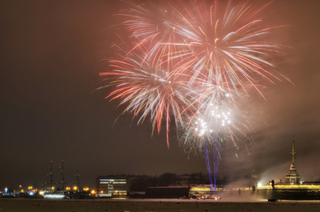Beautiful festive fireworks for Christmas.Bright fireworks over the Peter and Paul fortress.の写真素材
