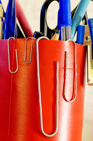 The paper clip is used to fasten paper sheets.It's a stationery tool.の写真素材