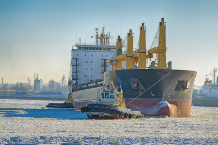 To tow a large tanker in the port for loading.の写真素材