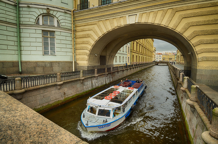 Saint-Petersburg.Russia.November.08.2017.Tourist ships floating on the rivers and canals of the city.They carry city tours.のeditorial素材