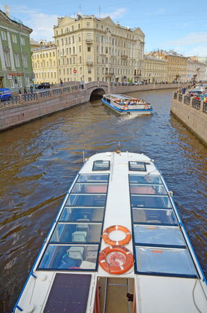 Saint-Petersburg.Russia.August.03.2016.Tourist ships floating on the rivers and canals of the city.They carry city tours.のeditorial素材