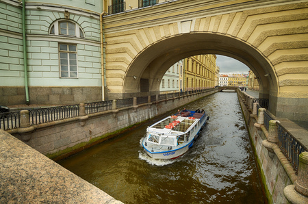 Saint-Petersburg.Russia.November.08.2017.Tourist ships floating on the rivers and canals of the city.They carry city tours.のeditorial素材