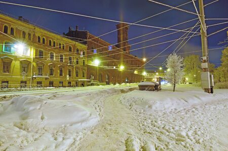 Night city in winter.It's freezing outside.There is a lot of snow around.の写真素材