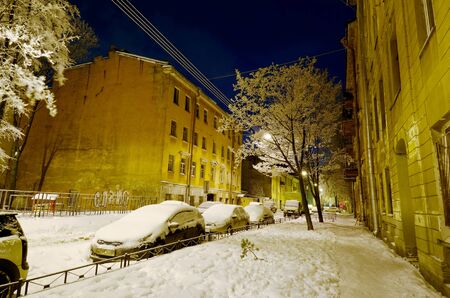 Night city in winter.It's freezing outside.There is a lot of snow around.の写真素材