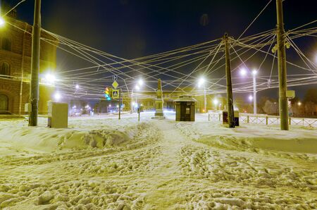 Night city in winter.It's freezing outside.There is a lot of snow around.の写真素材